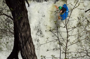 Boofing the local waterfall in Middlebury. Photo Daphnee Tuzlak.