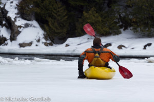Christian Woodard stoically schooches upstream on Otter Creek in February.