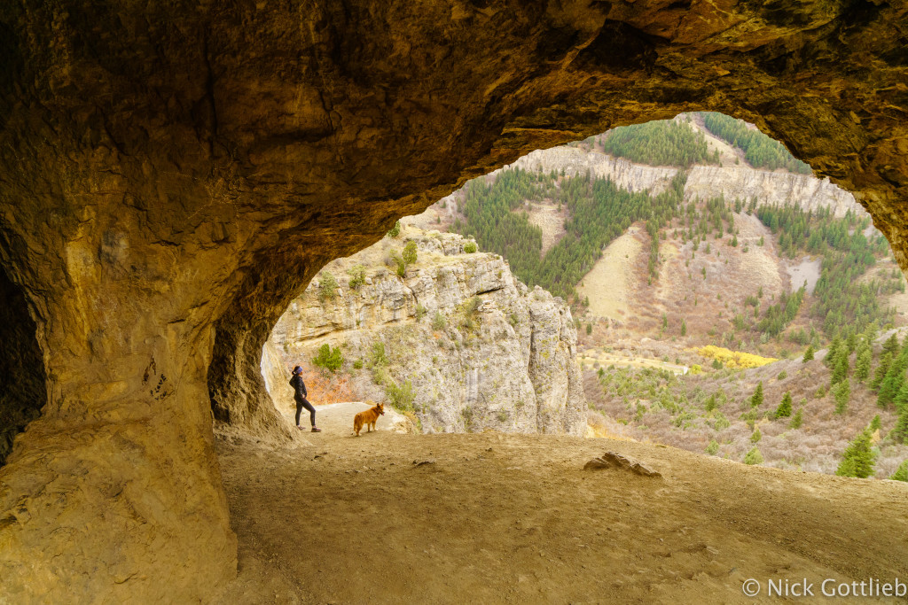 The cave sits perched on top of a limestone cliff band and has epic views of Logan Peak on the other side of the canyon.