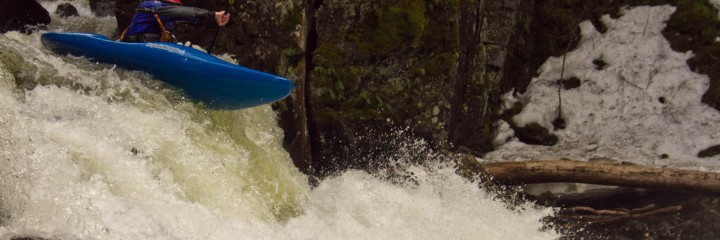 Christian Woodard boofing the last drop on the Terrill Gorge.