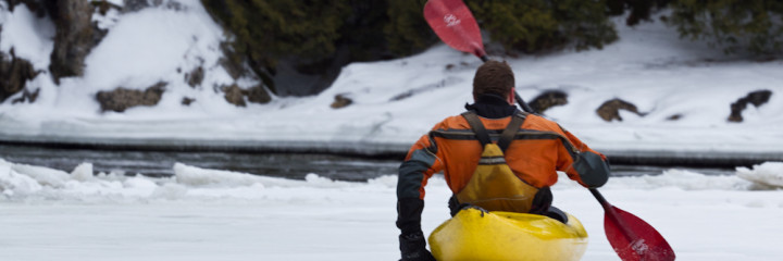 Christian Woodard stoically schooches upstream on Otter Creek in February.